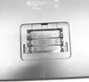 A close-up view of a battery compartment on the underside of a device. Produktbild-Vorschau