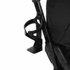 A close-up of a black cup holder attached to a stroller frame. Náhľad obrázku produktu