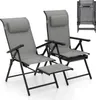 Two gray folding lounge chairs with headrests and a pull-out footrest are shown against a white background. A folded chair is visible in the upper right corner. Produktbild-Vorschau
