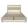 A beige upholstered bed frame with a headboard and footboard, shown from the front. Náhľad obrázku produktu
