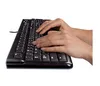 Hands typing on a black keyboard. Produktbild-Vorschau
