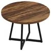 A round wooden table with black metal legs on a white background. Podgląd zdjęcia produktu