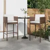 Two bar stools and a table set up on a patio. Náhľad obrázku produktu