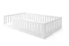 A white wooden bed frame with safety rails, shown from a diagonal angle against a white background. Produktbild-Vorschau