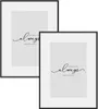 Two black metal picture frames with white mats and printed text on a white background. Produktbild-Vorschau