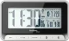A digital alarm clock with a black frame and a white display showing the time, date, and temperature. Anteprima dell’immagine prodotto