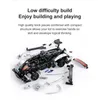 A disassembled toy sports car kit with accompanying text. Produktbild-Vorschau