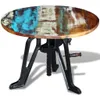 A round, adjustable height side table with a reclaimed wood top and a cast iron base. Anteprima dell’immagine prodotto