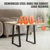 A coffee table with black metal legs is shown in a living room setting, next to a sofa. Large orange text indicates a weight capacity. Voir les images du produit