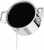 A stainless steel pot with a black interior is tilted, pouring water out. Podgląd zdjęcia produktu