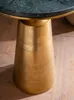 Close-up of the base of a round table with a green marble top and a gold-colored, conical pedestal base. Produktbild-Vorschau