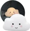 A close-up of a white cloud-shaped night light with a smiling face, with another glowing cloud night light visible in the background. Voir les images du produit
