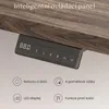 A close-up view of an intelligent control panel attached to the underside of a wooden desk, with accompanying feature descriptions below. Náhled obrázku produktu