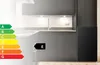 An energy efficiency rating label overlaid on a kitchen scene. Produktbild-Vorschau