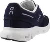 A close-up side view of a blue and white running shoe. Voir les images du produit