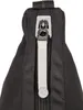 A close-up view of a black bag's zipper. Anteprima dell’immagine prodotto