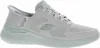 A side view of a gray Skechers sneaker. Produktbild-Vorschau