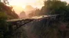 A bridge in a jungle environment with a sunset in the background. Produktbild-Vorschau