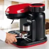 A person's hand is shown operating a red and black espresso machine. Produktbild-Vorschau