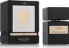 A perfume bottle and its packaging are displayed side-by-side on a white background. Voir les images du produit