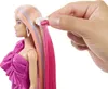 A close-up of a Barbie doll with colorful hair extensions being attached. Anteprima dell’immagine prodotto