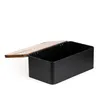 A black bread bin with an open wooden lid, shown against a white background. Produktbild-Vorschau