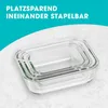 Stackable glass containers on a textured surface with a teal background. Voir les images du produit