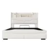 A white upholstered bed frame with a headboard featuring storage compartments and a built-in LED light strip. Voir les images du produit
