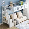 A white bunk bed with a sofa underneath, set in a child's bedroom with blue walls and a rug. Produktbild-Vorschau