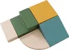 A collection of colorful foam building blocks arranged in a playful, abstract formation on a white background. Anteprima dell’immagine prodotto