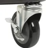 A close-up of a black caster wheel with a silver metal bracket and a brake lever. Podgląd zdjęcia produktu