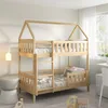 A wooden bunk bed with a house-shaped frame is set up in a child's bedroom. Produktbild-Vorschau