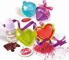 A collection of items for making lip balm, including molds, flavoring, and decorative elements. Náhled obrázku produktu