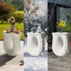 A triptych showing a white side table in different weather conditions: sunny, snowy, and rainy. Náhled obrázku produktu