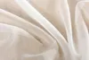 A close-up of flowing white sheer fabric. Produktbild-Vorschau