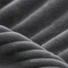 A close-up shot of a dark gray corduroy fabric with a ribbed texture. Produktbild-Vorschau