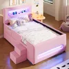A pink children's bed with LED lighting and storage features, set in a bedroom. Náhľad obrázku produktu