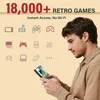 A man is holding a handheld gaming console, with various retro gaming icons and text about "18,000+ Retro Games" displayed on a light yellow background. Produktbild-Vorschau