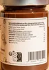 A close-up of a jar of spread, showing the nutritional information label and barcode. Produktbild-Vorschau