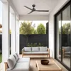 A covered outdoor patio with modern furniture and a ceiling fan. Produktbild-Vorschau