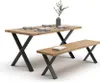 A wooden dining table and bench with black X-shaped legs, set against a white background. Anteprima dell’immagine prodotto