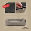 A collage showing details of a dog bed, including its non-slip base, zipper closure, and the bed itself, with a brand logo at the bottom. Produktbild-Vorschau