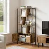 A bookshelf with cabinet doors open, displaying various items on its shelves, placed in a room with a window and a TV stand nearby. Produktbild-Vorschau