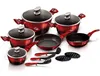 A collection of red and black cookware set with glass lids and utensils, arranged on a white background. Náhled obrázku produktu