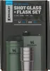 The image shows the packaging of a Stanley shot glass and flask set. The packaging is dark gray with text and graphics describing the product. The product itself is visible inside the packaging, including a green flask, a green container, and a stack of si Produktbild-Vorschau