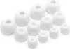 A collection of white silicone earbud tips of various sizes arranged on a white background. Voir les images du produit