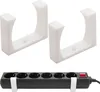 Two white plastic brackets and a black power strip with white straps. Produktbild-Vorschau