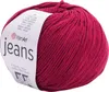 A ball of red yarn with a white label. Podgląd zdjęcia produktu