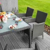An outdoor dining set on a wooden deck next to a lawn. Náhľad obrázku produktu