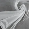 A close-up, draped view of white sheer fabric. Produktbild-Vorschau